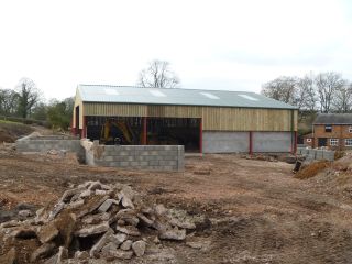 Barn in construction showing the large access space and skylights