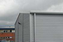 Exterior detailing for the workshop showing guttering incorporated into the design
