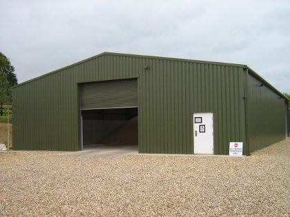 Green barn from a simple steel shed